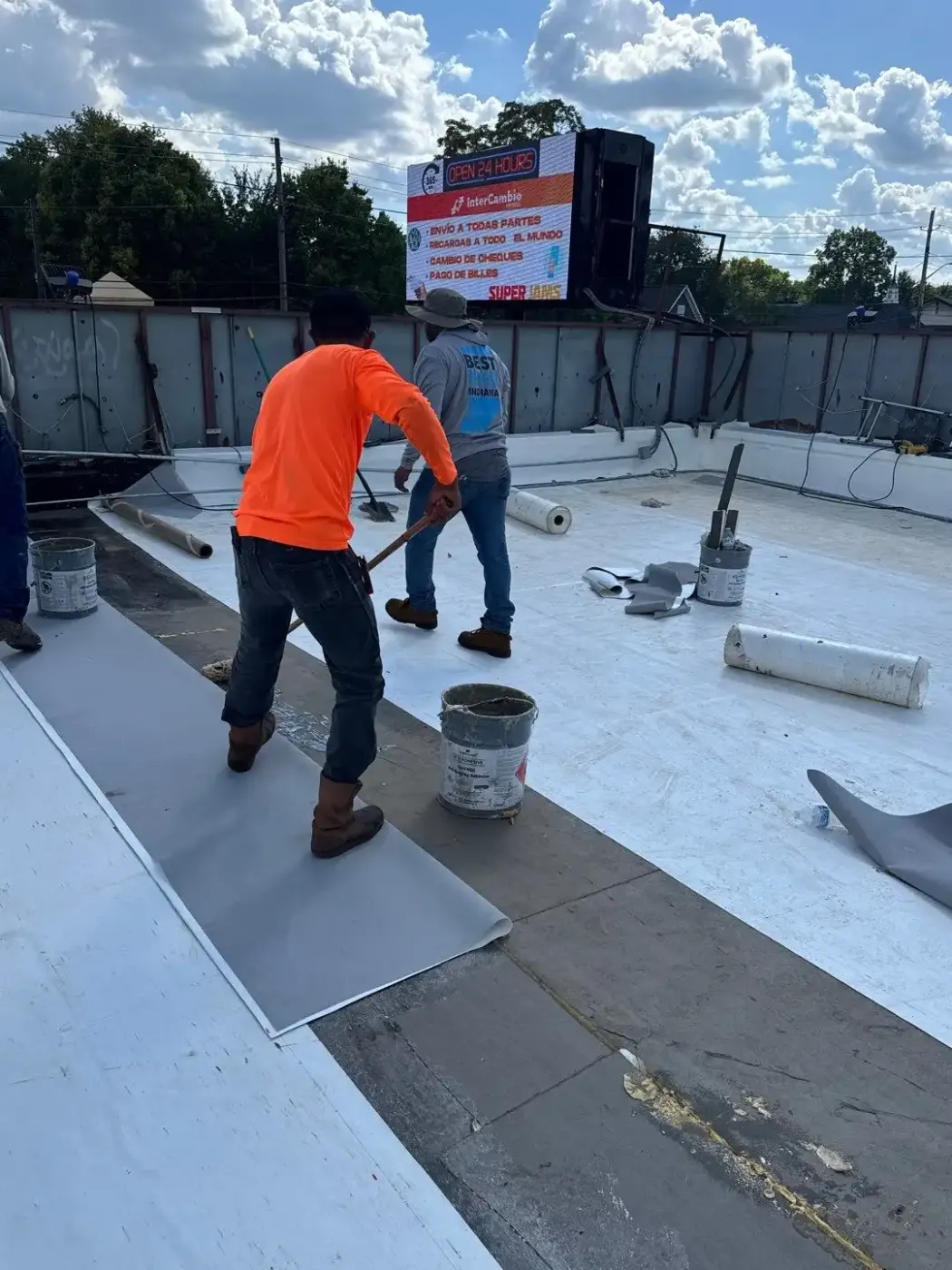Tarping and dry-in on a Fortville commercial roof
